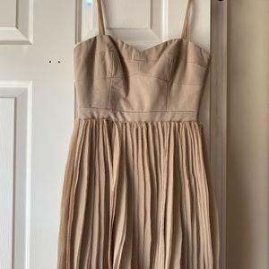 BCBG dress in tan color never worn before
